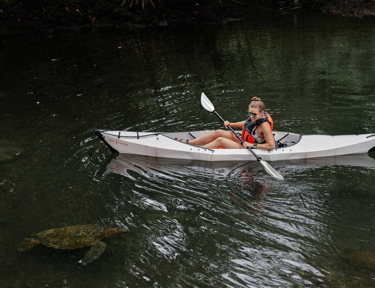 Oru Kayak Beach LT portable folding kayak folds down to the size of a couch cushion